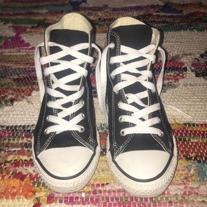 Black and white high top converse
